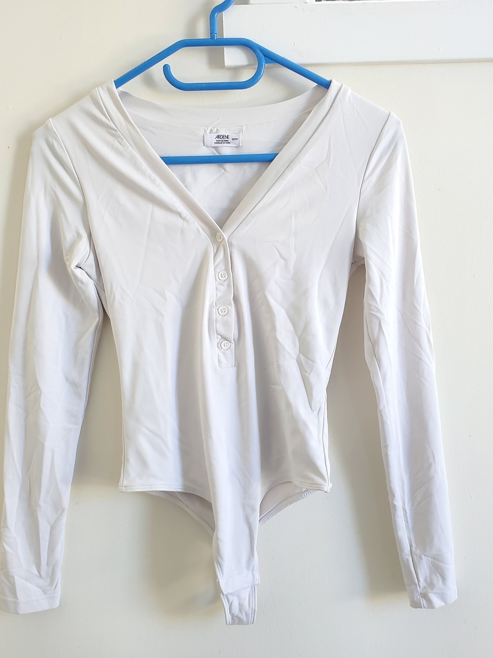 Ardene White Long-Sleeve V-Neck Button Bodysuit